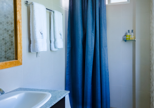 Ensuite bathroom in Seashell Suite with modern amenities.