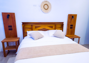 Comfortable bedroom in Seashell Suite with a cozy bed.