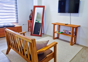 Cozy living room in Seashell Suite with a comfortable seating area.