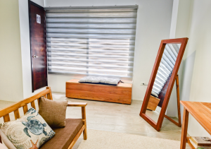 Cozy living room in Seashell Suite with a comfortable seating area.