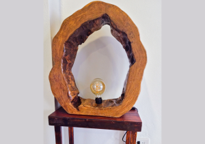 Elegant living room with a cozy sofa, stylish decor, and natural light.